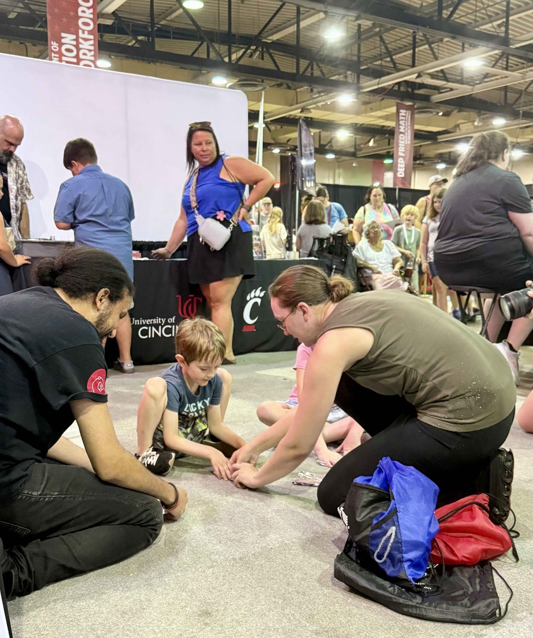 Kids enjoy UC's interactive science activities at the Ohio State Fair.