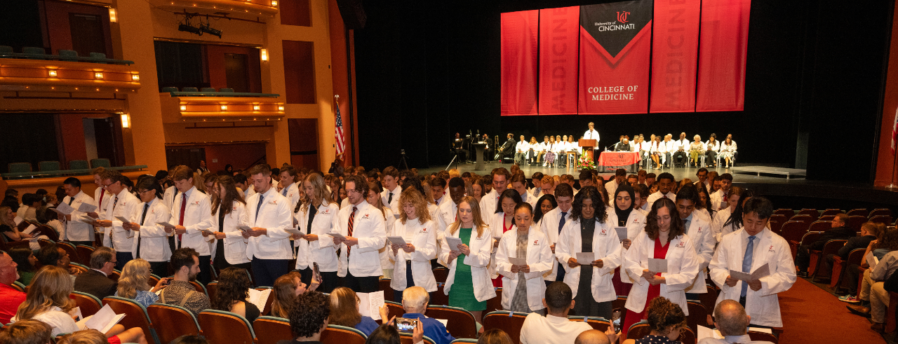 Members of the UC College of Medicine Class of 2029 recite their Class Oath of Professionalism during their White Coat Ceremony. 