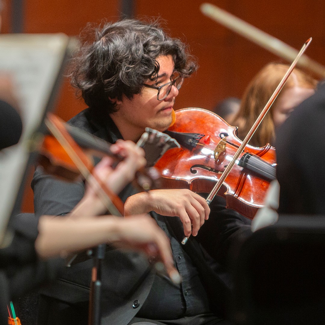 CCM Philharmonia performs on stage