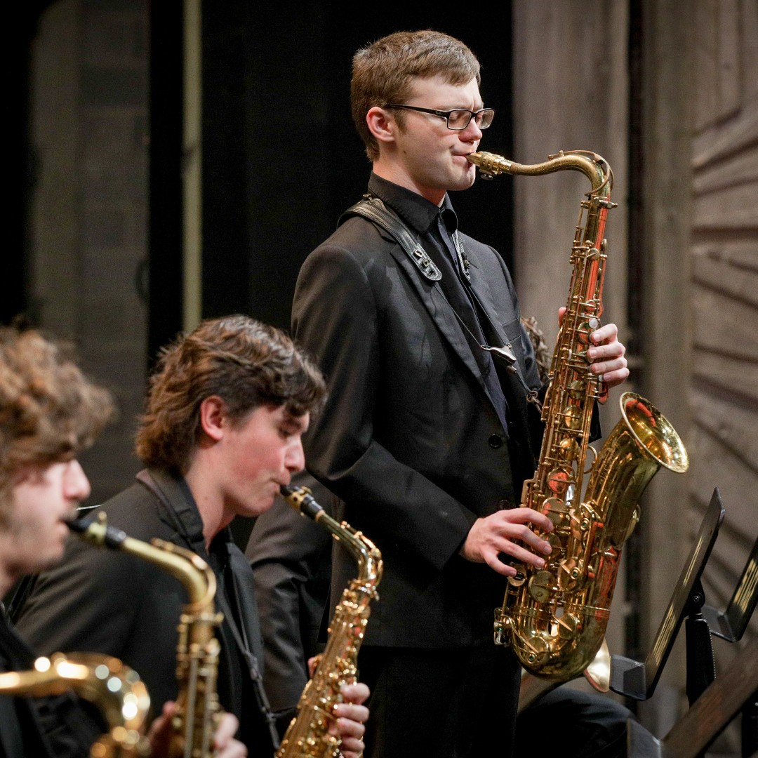 CCM Jazz Orchestra performs on stage. 