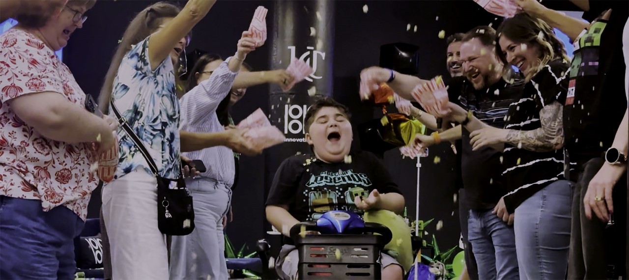 Jude catches popcorn thrown by guests.