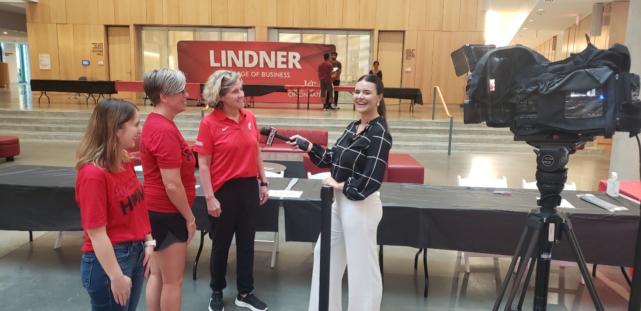 CECH organizers Brandilyn Pham and Stacey Jenkins are shown with Linder Dean Marianne Lewis enjoying a light moment with Local 12's Chloe Marklay