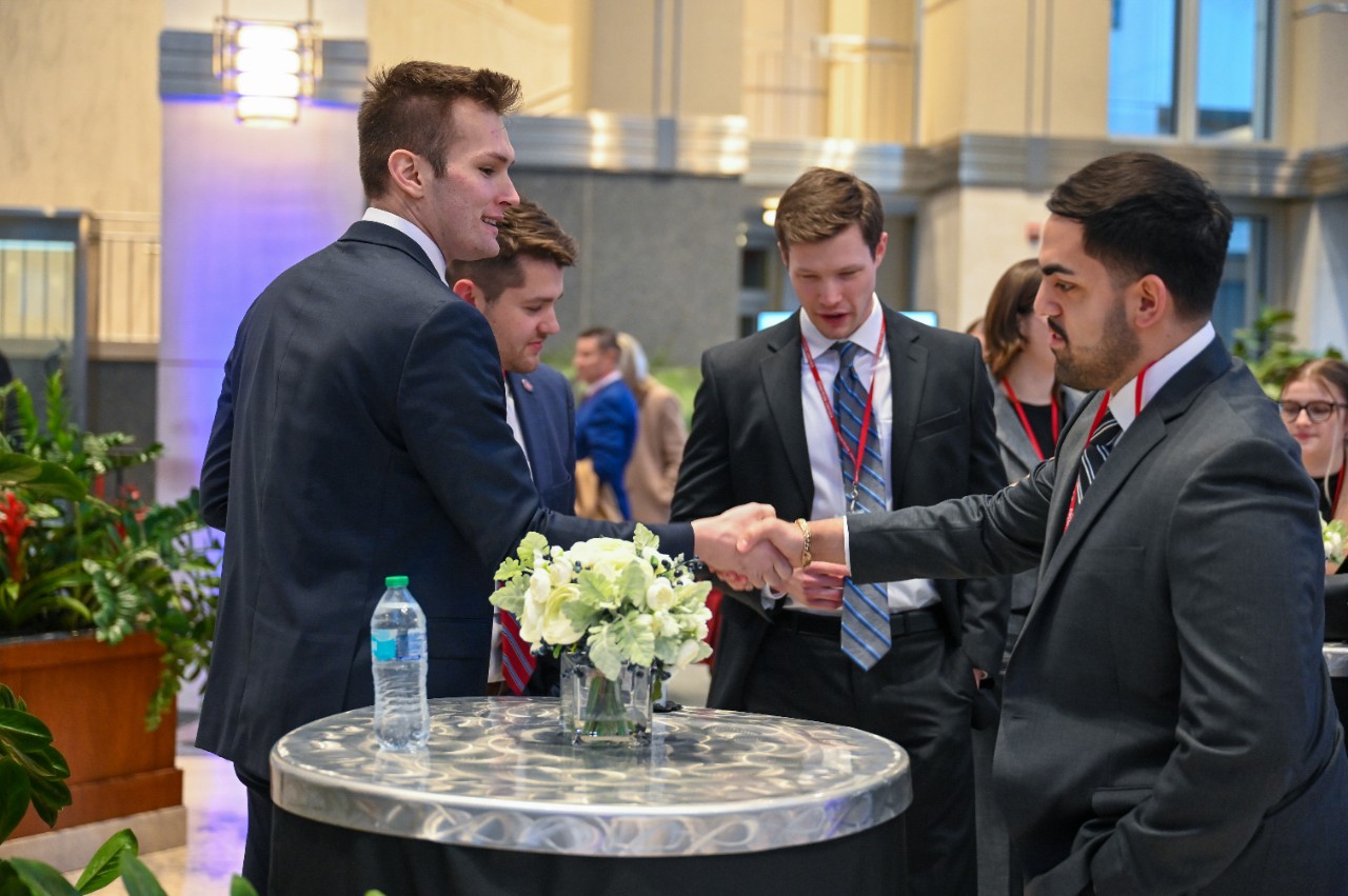 UC law students network at P&G/Mentor event. 