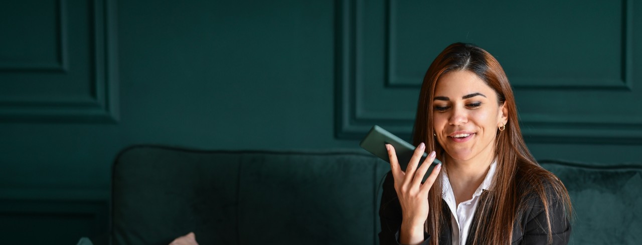 woman talking into her phone  