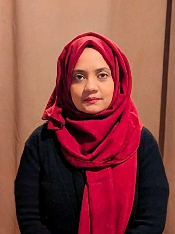 A headshot of a woman