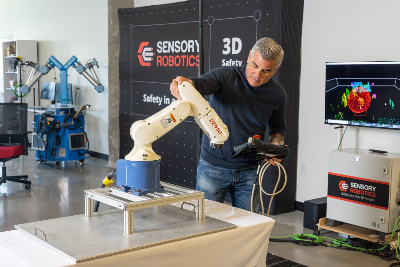 Mark Gagas, COO of Sensory Robotics is checking out the robot before testing.
