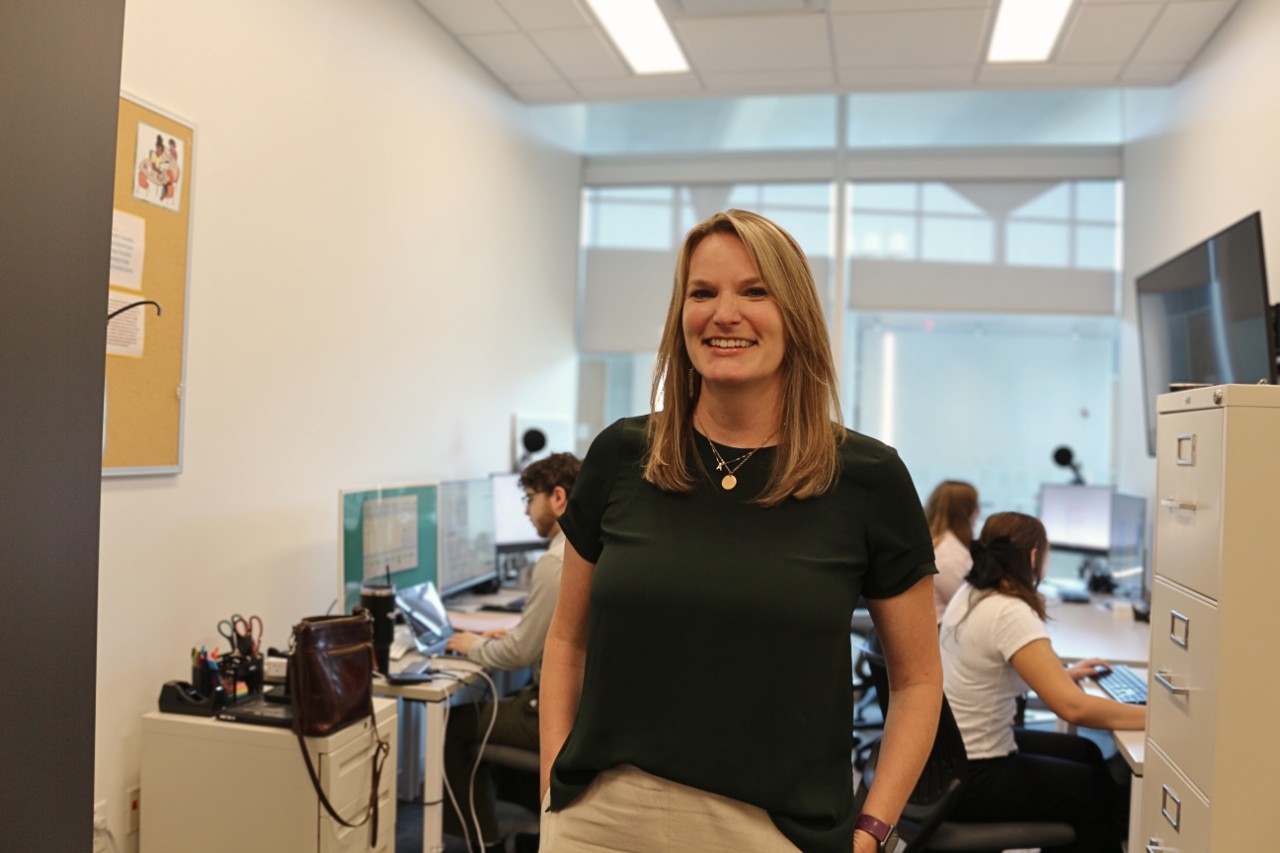 Andrea Ford with students in the background