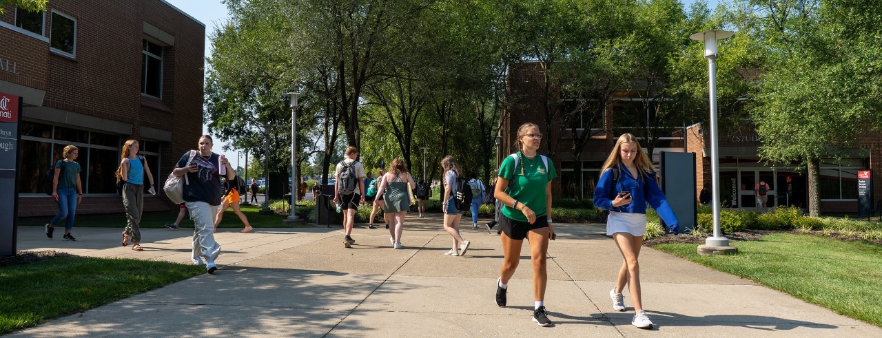 Students walk across the UC Clermont campus. 