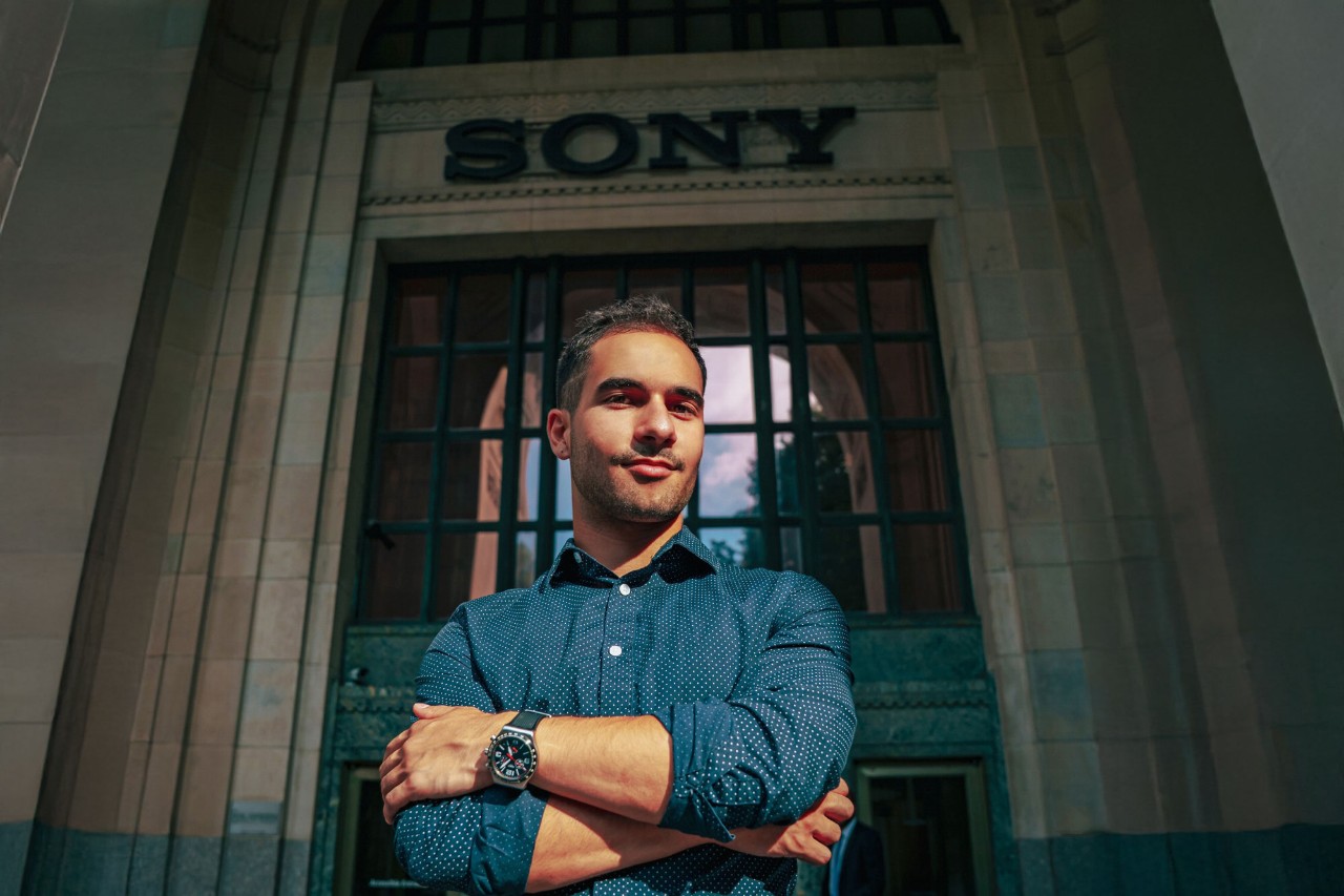 headshot of Nicholas Namyar in front of the Sony signage 