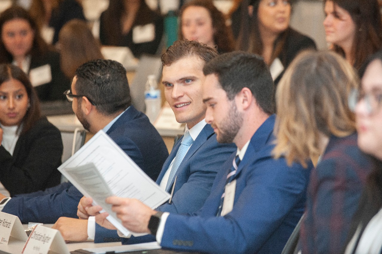 UC Law students talkk during Orientation