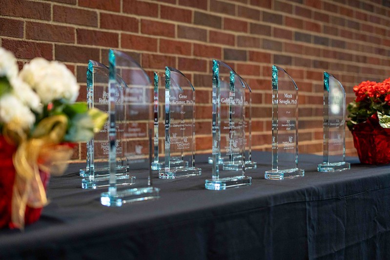table with glass trophies on display