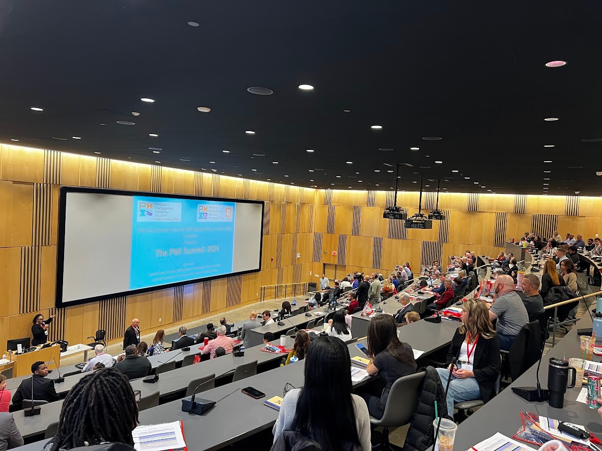 Attendees from the 2024 summit listen to the opening keynote.