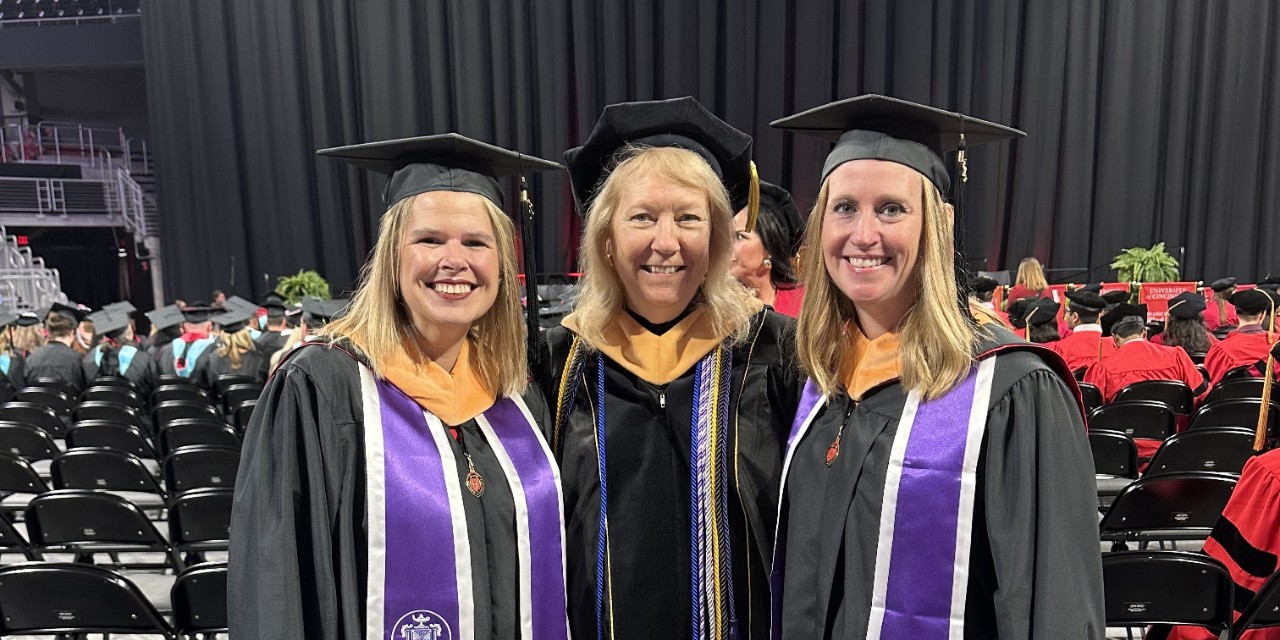 Tara Sand, Dr. Kathy Oliphant and Rebecca Sullivan at graduation