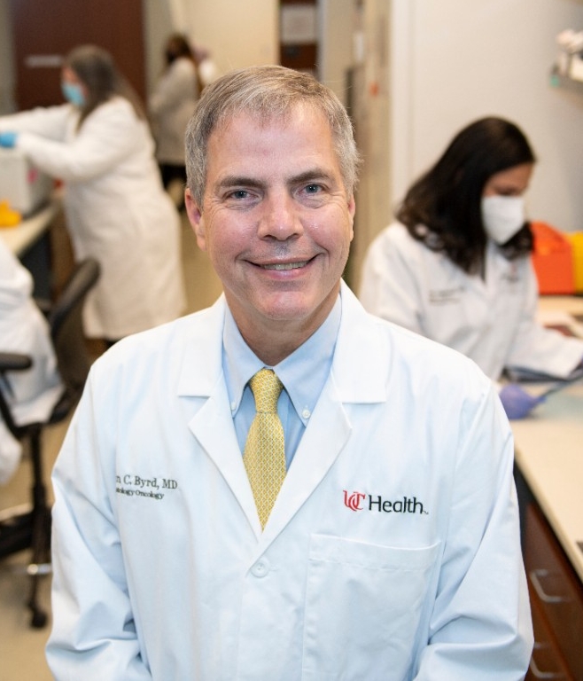 John C. Byrd, MD, in lab with his research team.