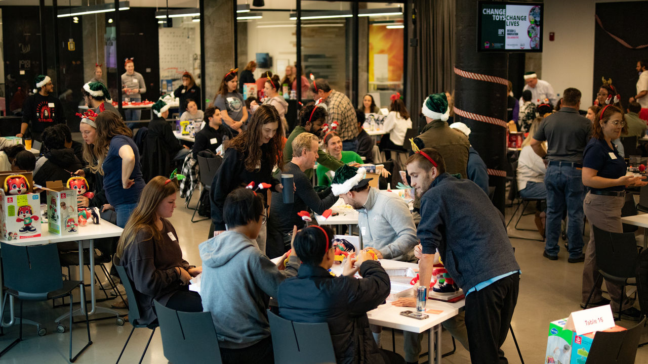 Volunteers pack the room of 1819 Innovation Hub. 