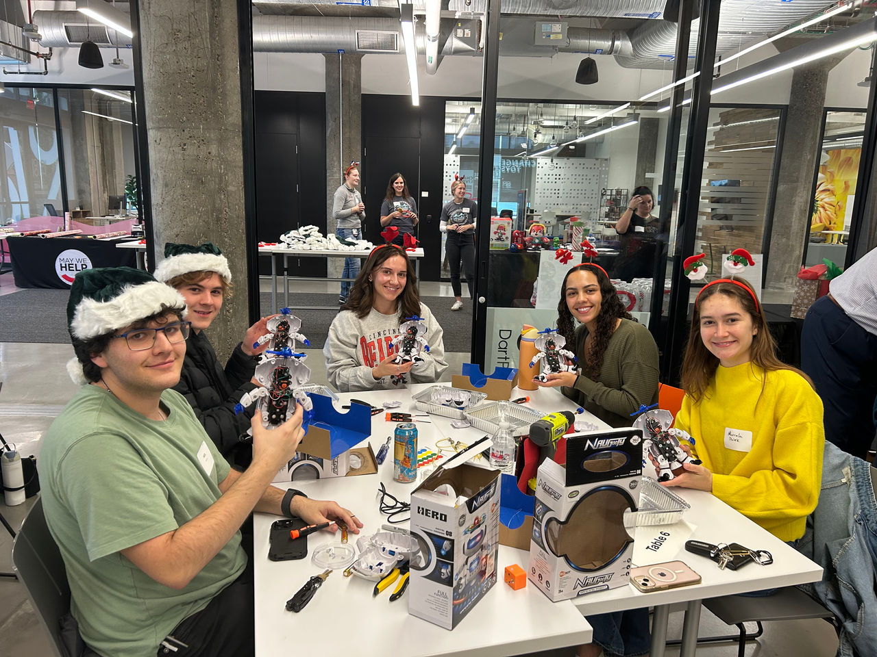 Group of students adapting toys 