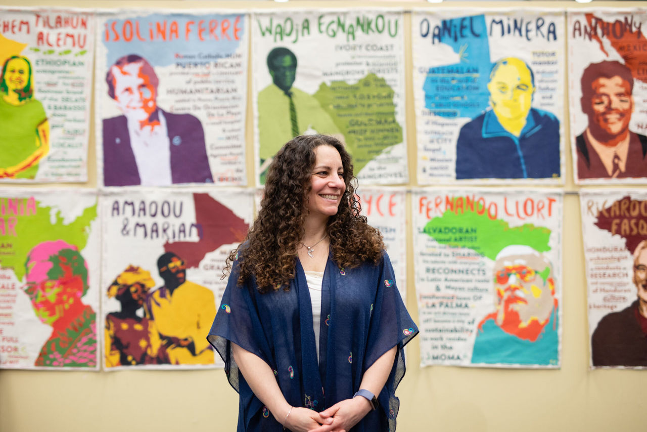 Julie Leftwitch, director, stands in front of wall