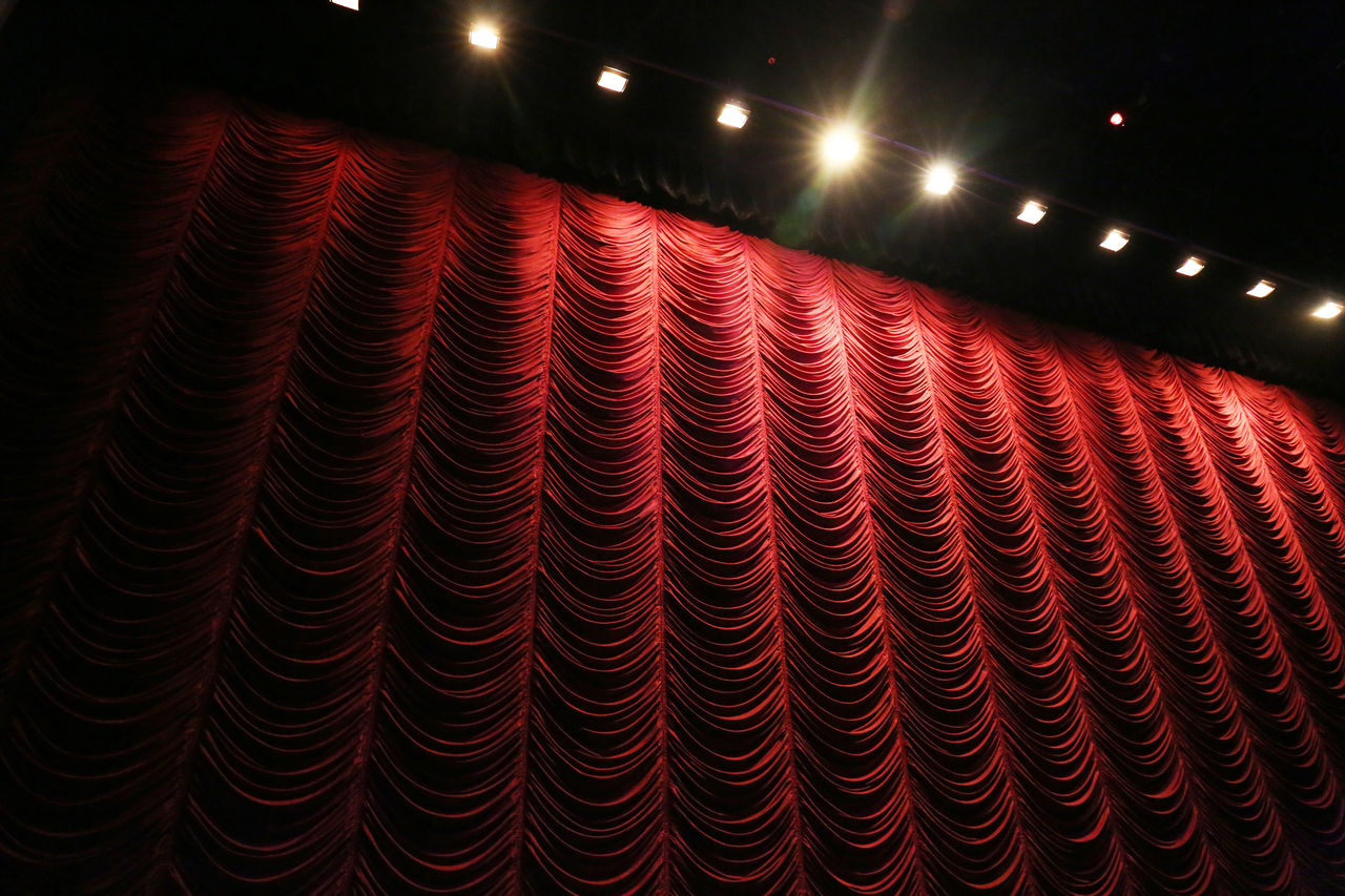 stage with red curtain and lights