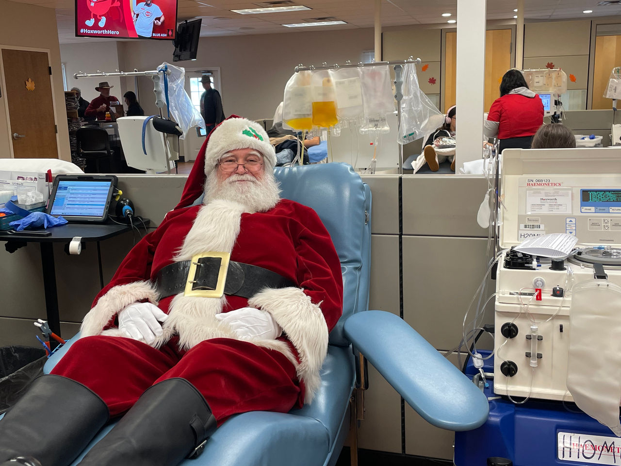 Santa Claus donating blood