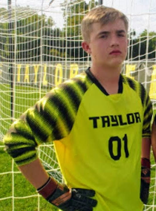 Nicholas playing soccer