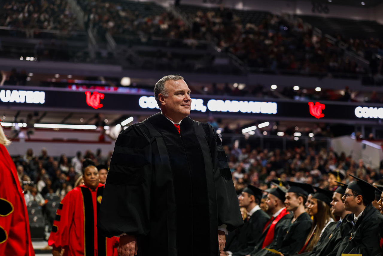 Phil Collins acknowledges people in the crowd at Fifth Third Arena.