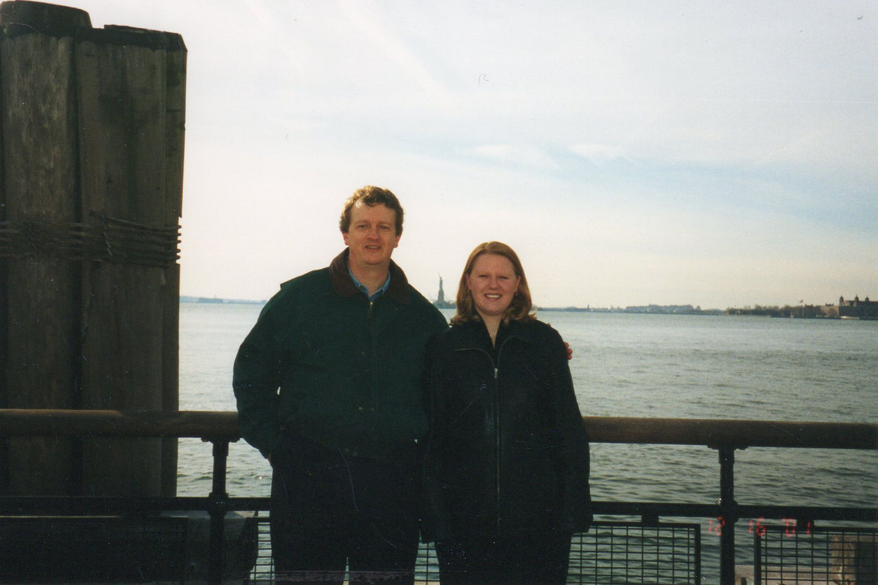 Bryan Speicher and Kelley Speicher Aronson in front of water.