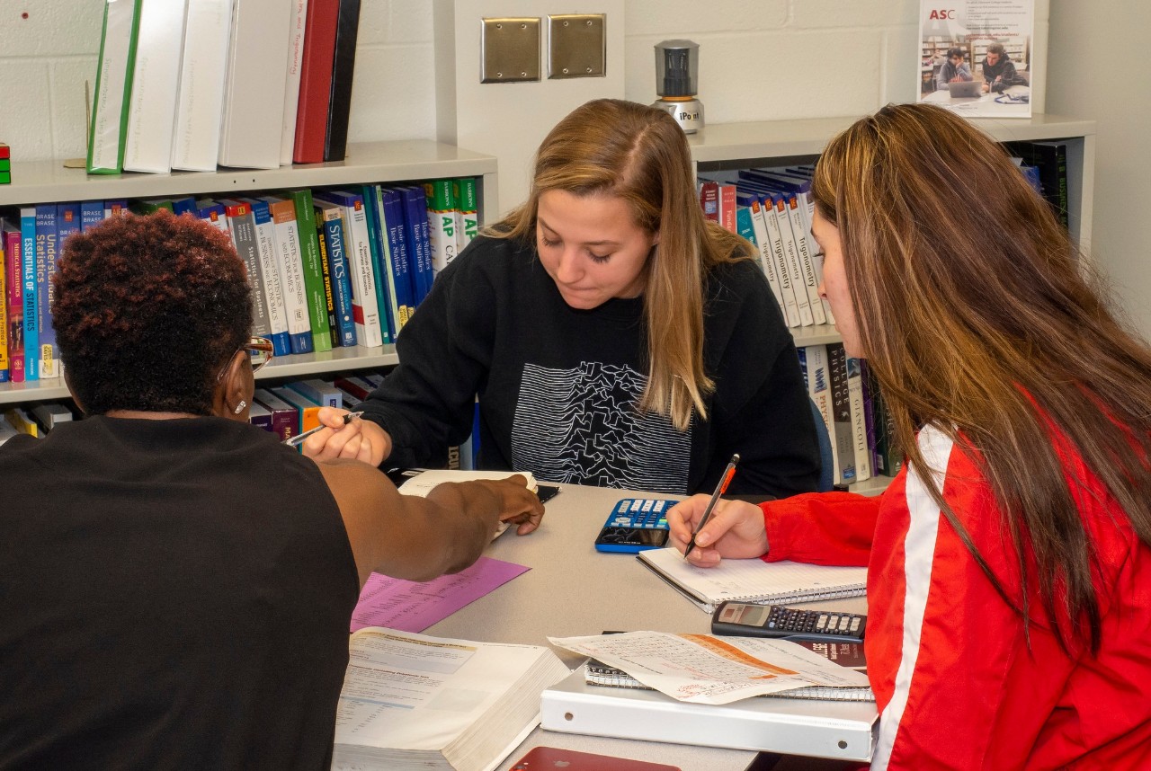 Students studying at a UC student success center