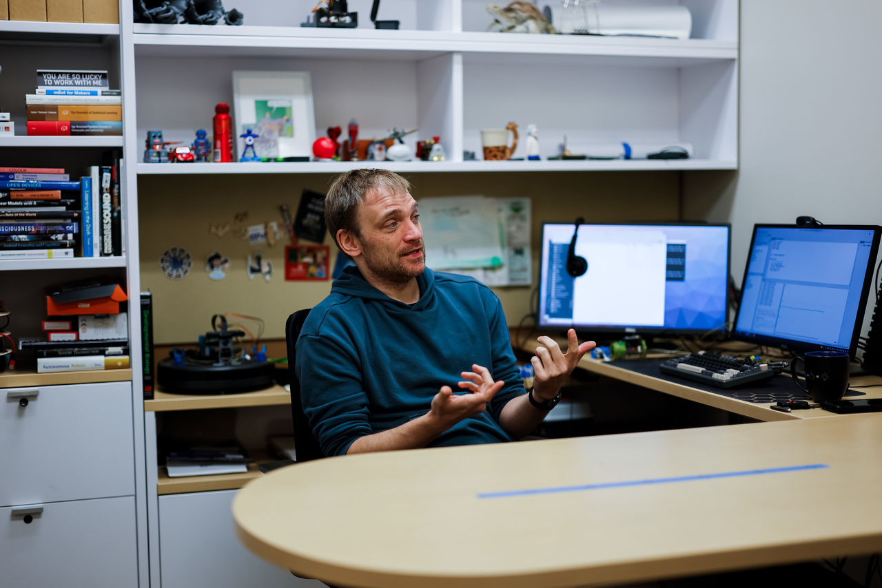 Dieter Vanderelst talks in his office.