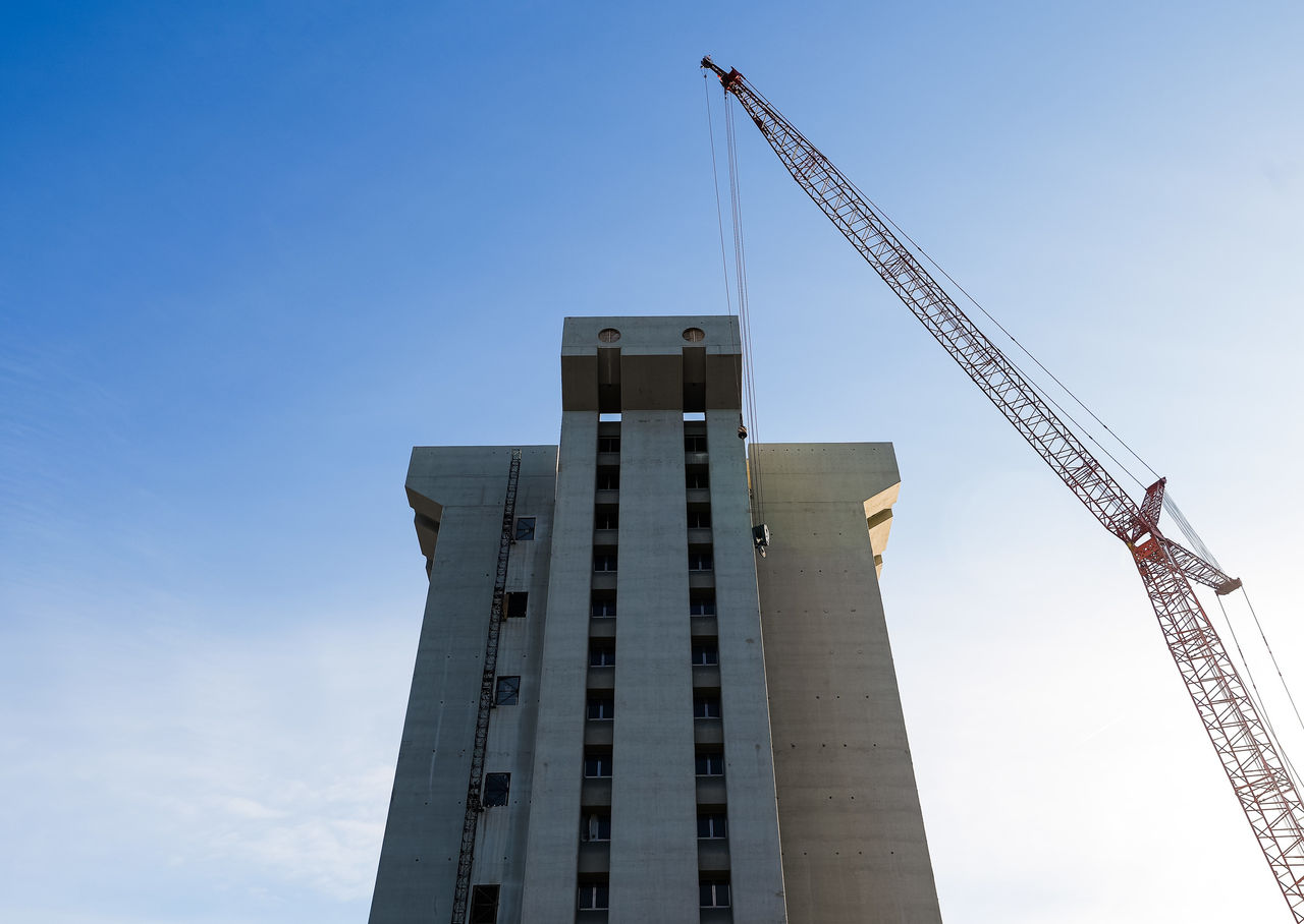 Crosley Tower with a blue sky and crane