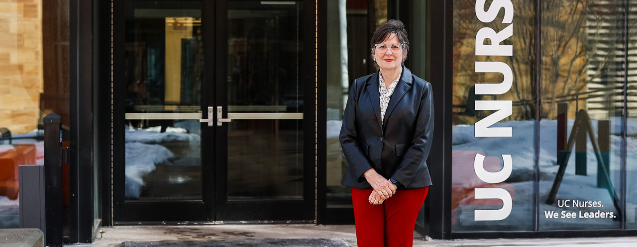 Melissa Cheeks in front of Procter Hall