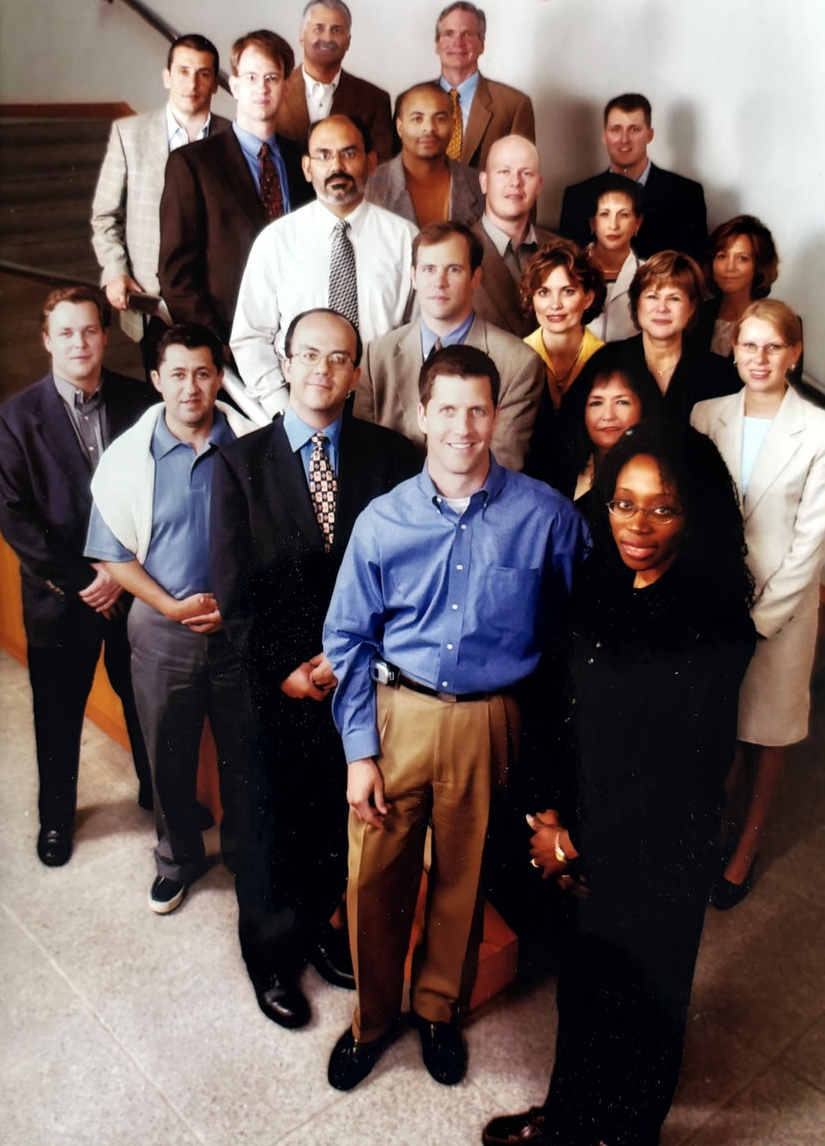 Cheeks (in yellow), then American Society for Metabolic and Bariatric Surgery President Dr. Alan Wittgrove and bariatric surgery fellows from across the country in 2003.