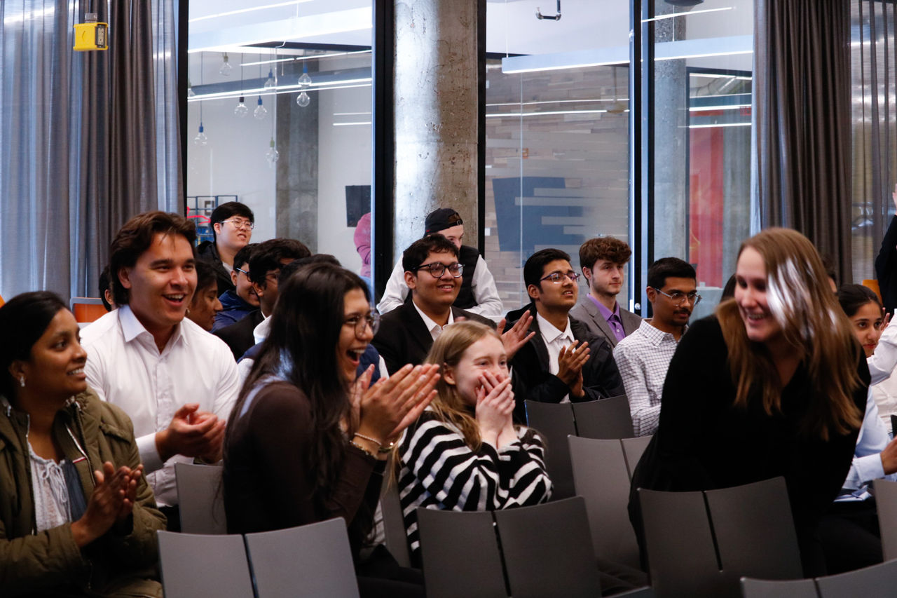 Teams celebrating during UC Startup Weekend. Photo/Kailyn Swarts