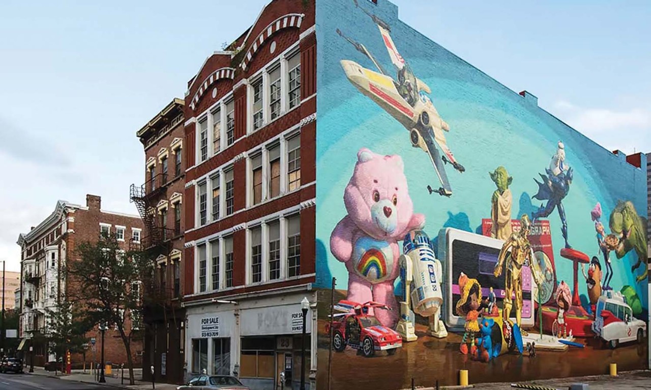 Mural of toys on the side of a building in Downtown Cincinnati
