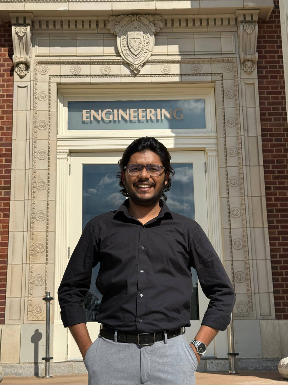 Vinay Chandra Patnala poses in front of UC's engineering building 