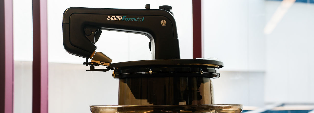 Image of the knitting machine head closeup