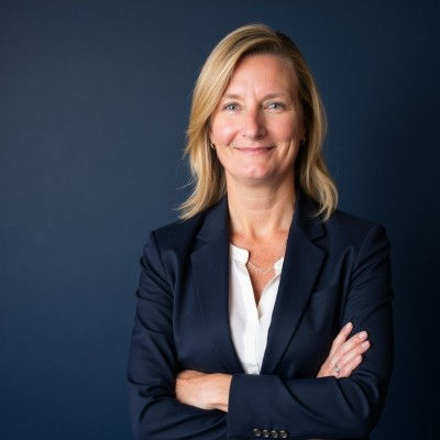 Jes Cornelius wearing a suit.