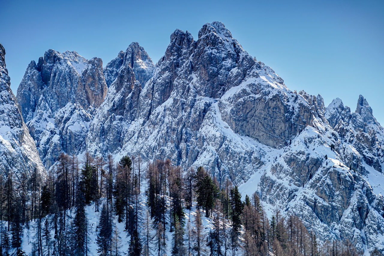 Snow-capped mountains in Italy, site of the 2026 Winter Olympics