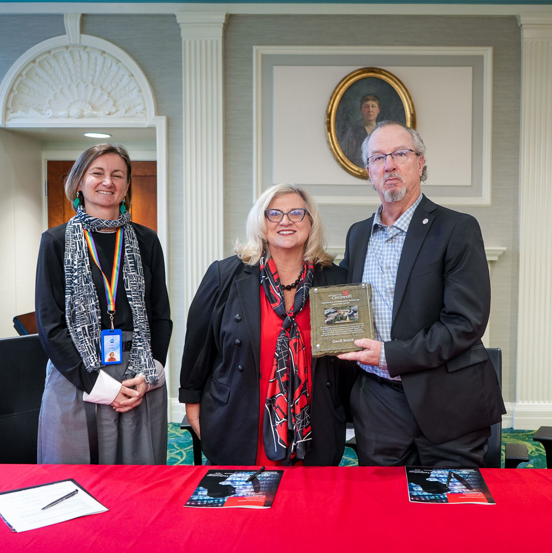 CECH Dean Lisa Huffman poses with two IT industry professionals