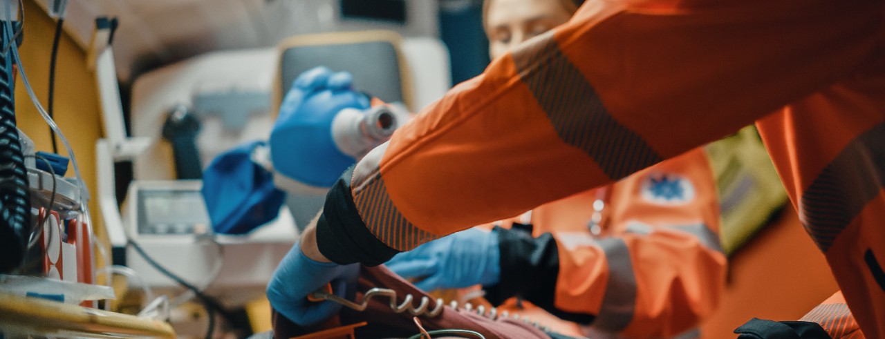 Medical care being performed in an ambulance. Photo/Gorodenkoff via Adobe Stock