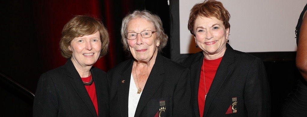 Peg Valentine, Nancy Hamant and Cnidy Coggins wearing black blazers.