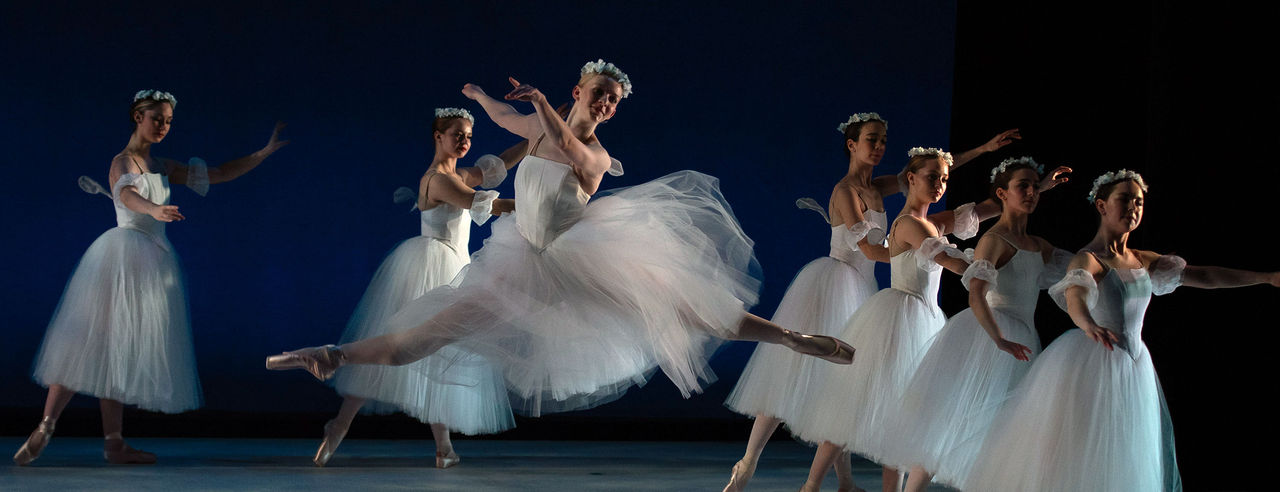 Students perform on stage during Dance Works.