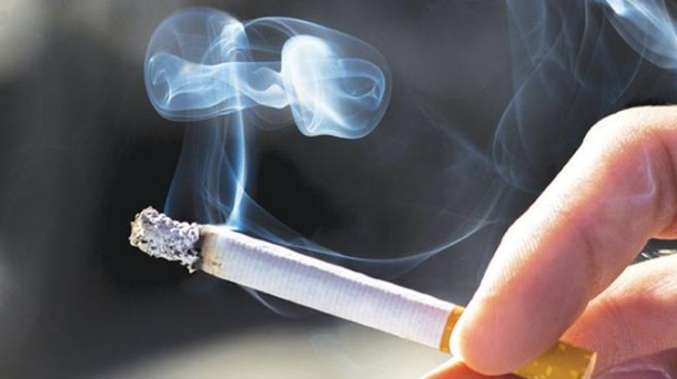 hand with a cigarette