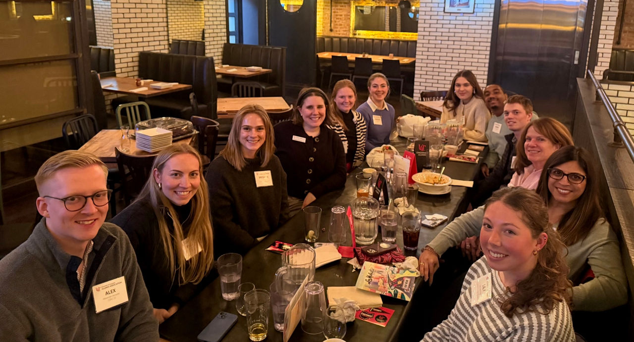 Group of UC students and alumni at Dinner with Bearcats, at Lou Malnati's, in Chicago.