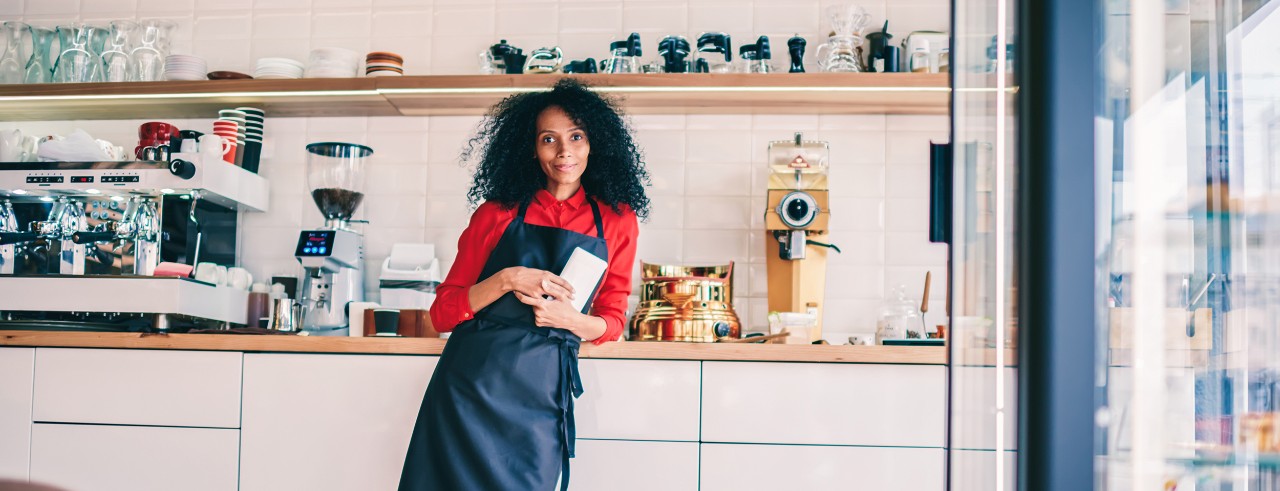Woman at her business venture. Photo/BullRun via Adobe Stock