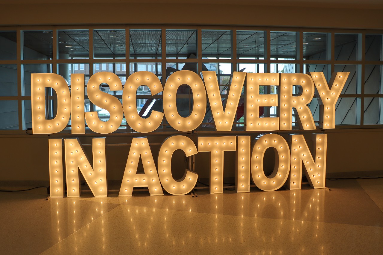 UC's Discovery In Action promotional sign.