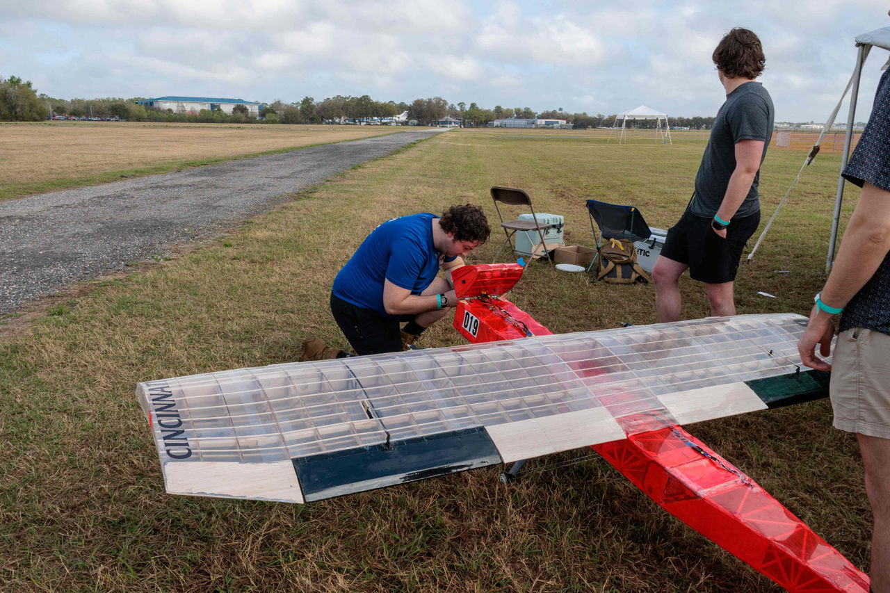 Aerocats preparing their plane for takeoff