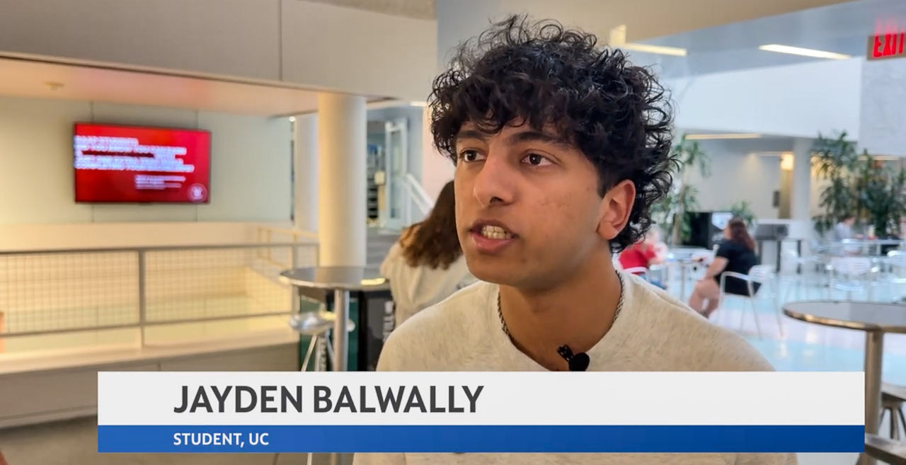 Jayden Balwally talks to Spectrum News with an overlay graphic of his name.