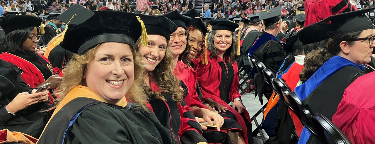 Dr. Tasha Turner-Bicknell and public health nursing students at commencement