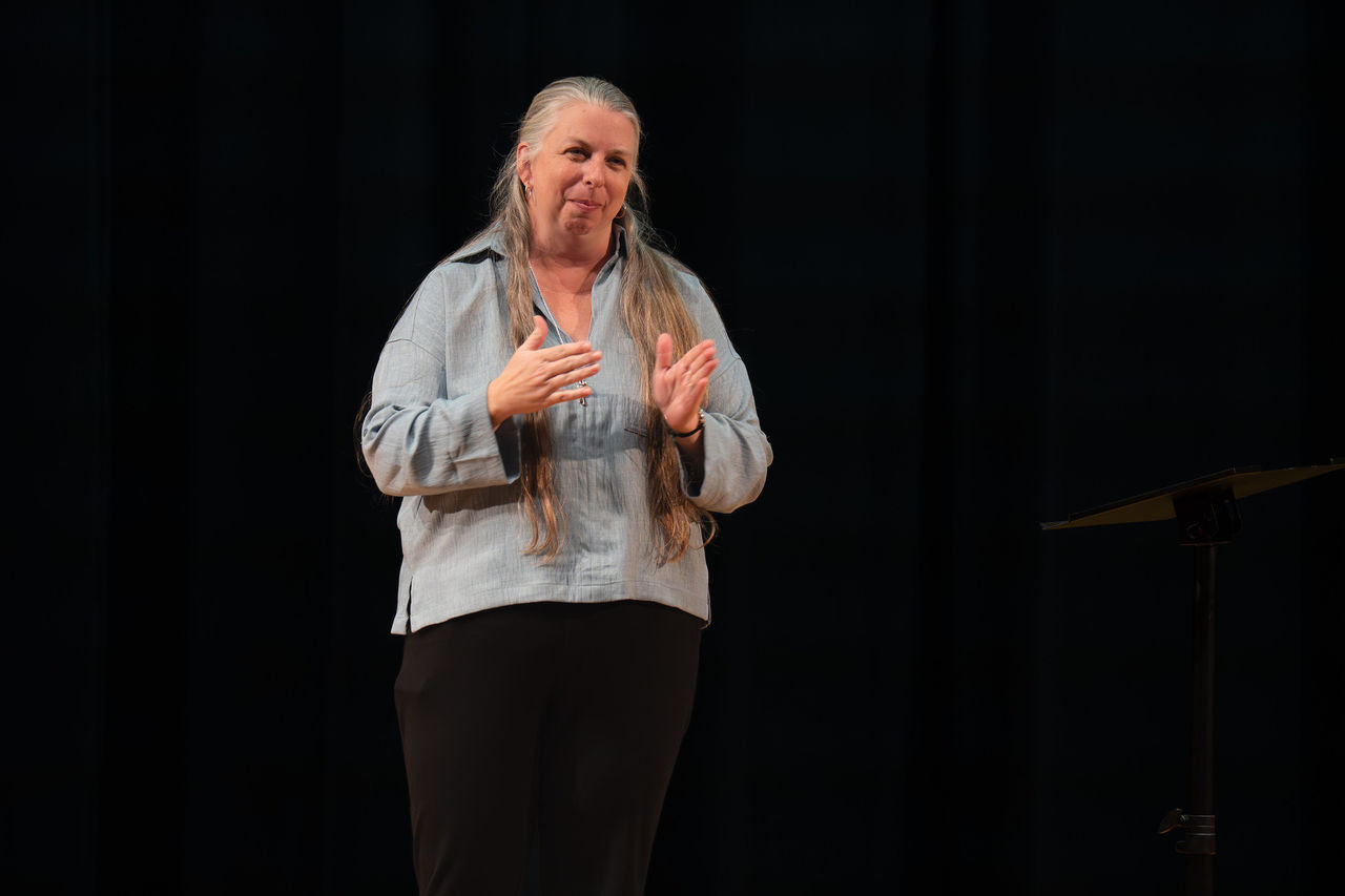 Kimberly Clifford, assistance professor of American Sign Language, introduces guests during UC Clermont’s ASL Storytelling Performance March 28. 