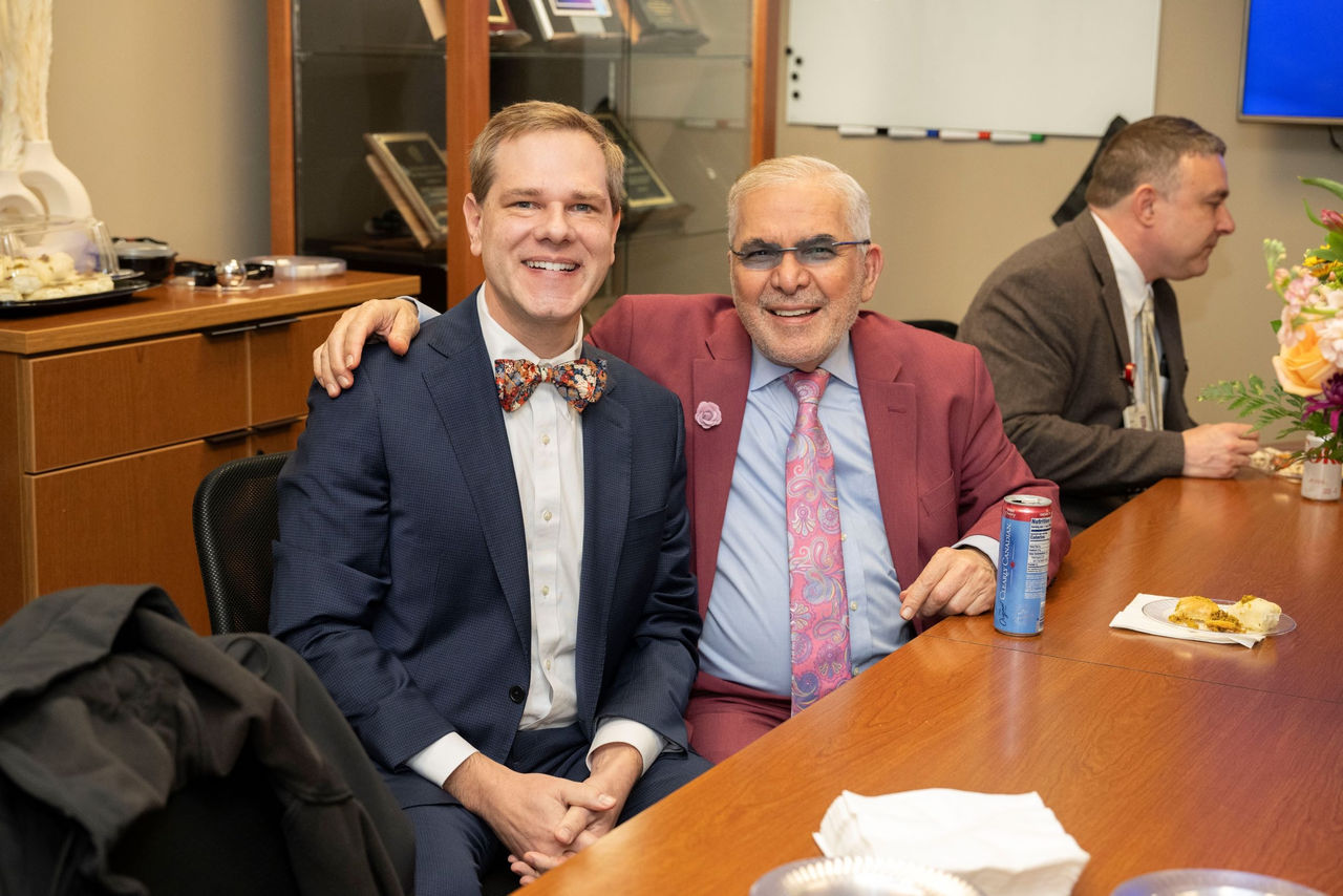Photo of Jeffrey Strawn and Henry Nasrallah smiling.